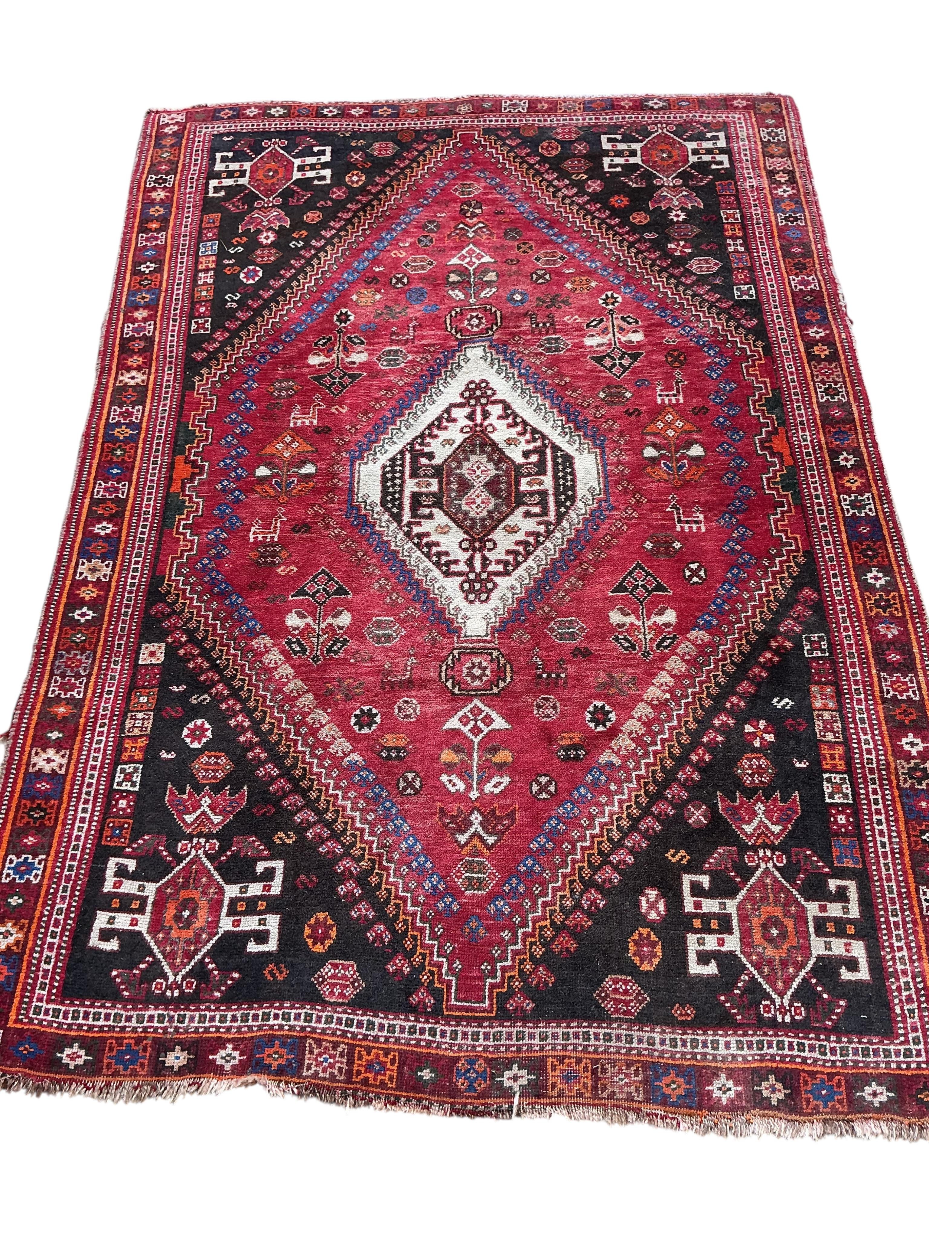 A Hamadan red ground rug, 176 x 128cm together with a smaller Bokhara mat